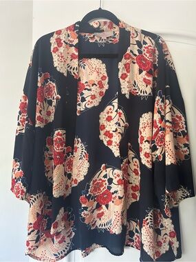 Laurie Felt  Floral Kimono Cardigan in a dark Navy with Red and Cream Blooms.